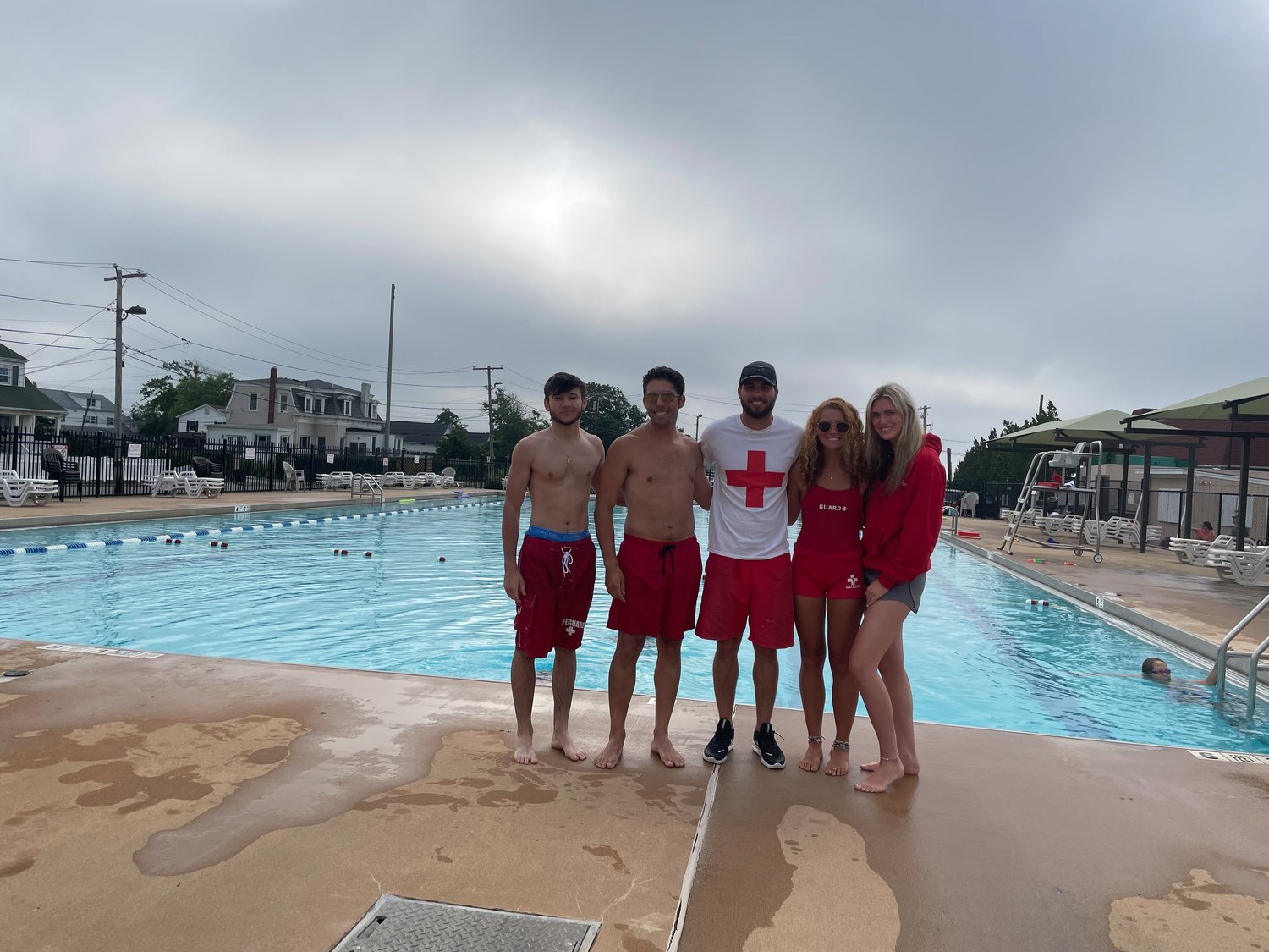 Swim instructors and lifeguards at the Patchogue Village pool. Center is Patchogue Beach Club manager and lifeguard Nick Constantino, who provided the tips.